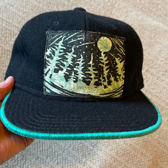 Accessories - OTTO Black wool trucker cap, forest patch, and teal stitching